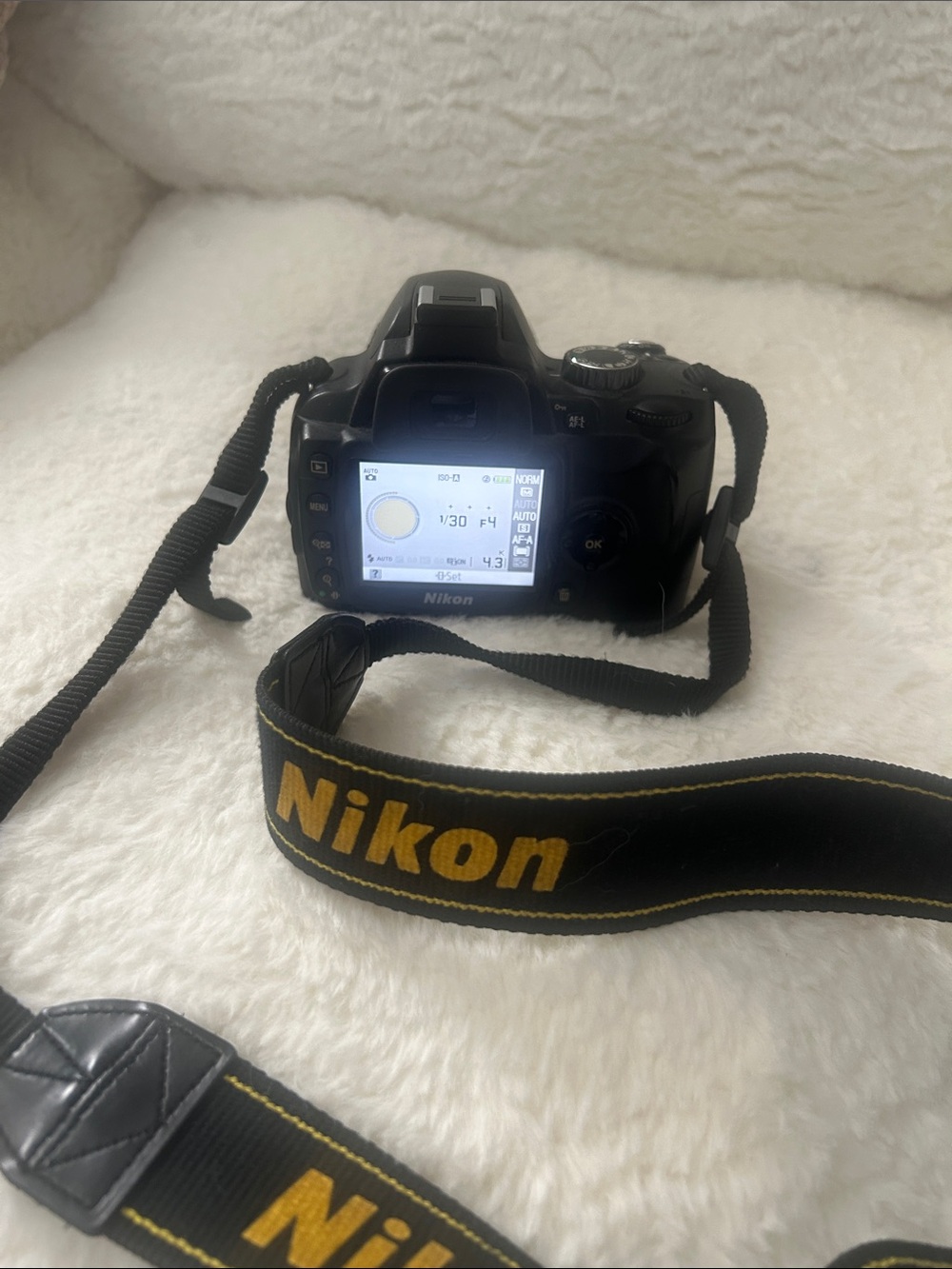 Nikon D60 Black DSLR Camera with Black and Yellow Branded Strap